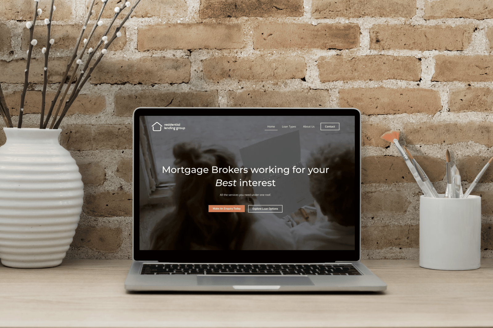 resilend website on laptop on desk in office